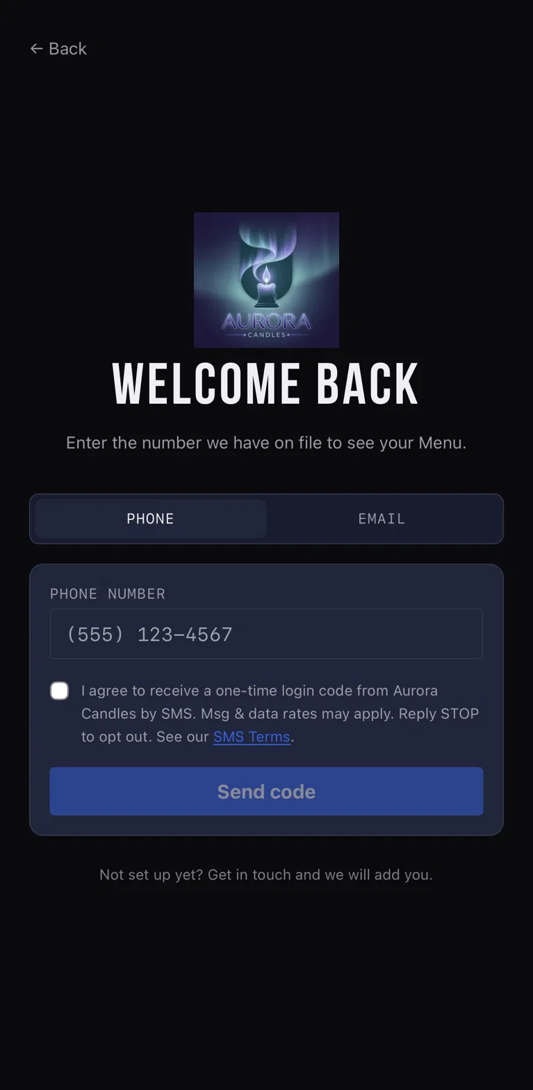 Phone sign-in tab showing the Phone/Email toggle, the phone-number field, an unchecked SMS consent checkbox, and an active Send code button.